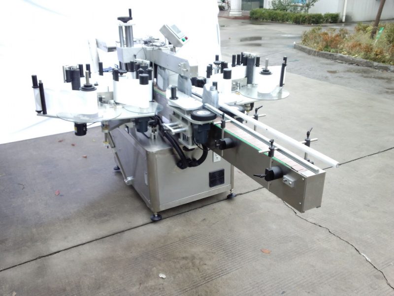 China Aplicator de etichetă pentru saci și sticle ovale, mașină de tipărit etichete autoadezive cu transportor lung furnizor